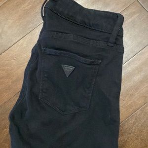 Guess black jeans, worn a couple times. No wear and tear.